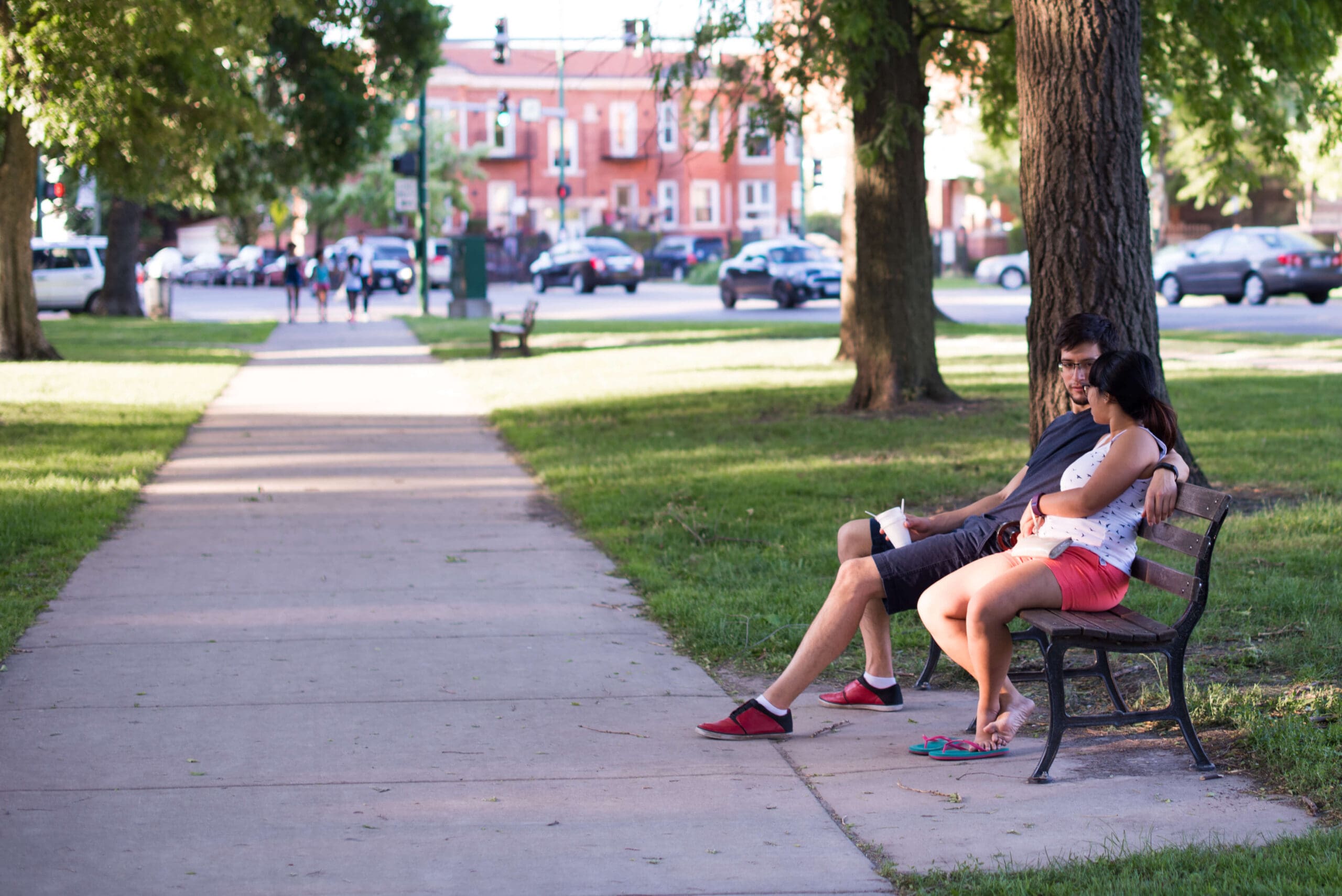 Couple sitting on bench in Palmer Square